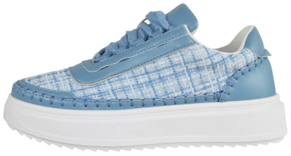Blue sneaker with a checkered pattern on a white background